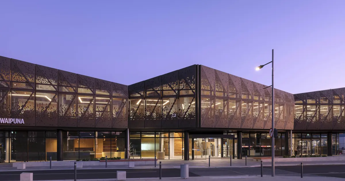 Illuminated bronze-hued façade of Te Kahu o Waipuna in Blenheim